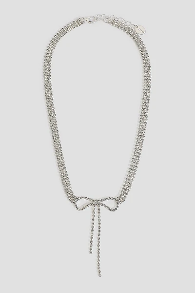 Ardene Rhinestone Bow Necklace in Silver