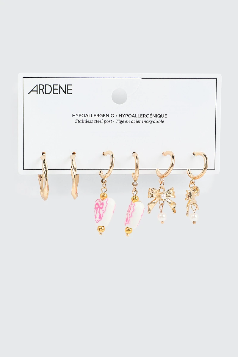 3 paires d'anneaux à détails de cœur et de boucle