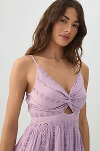 Robe mini torsadée à œillets