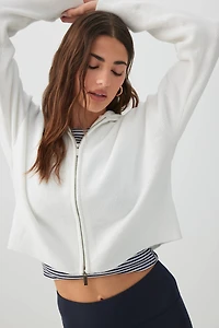 Chandail court à capuchon et glissière en tricot