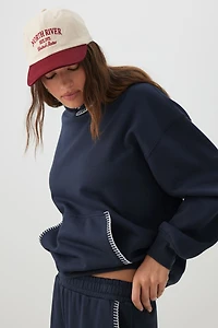 Chandail à capuchon ample point roulé