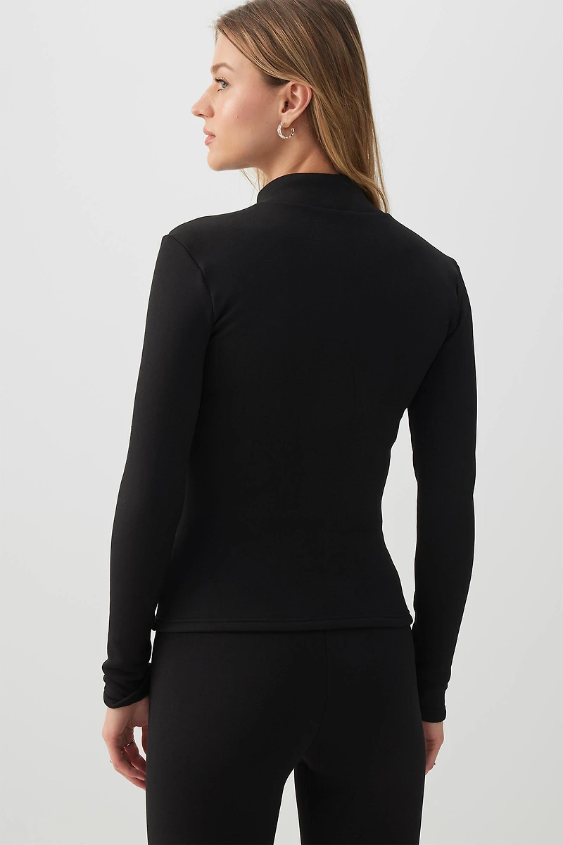 Haut à glissière doublé en fausse fourrure