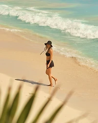 Bas de bikini jupe à insertions résille