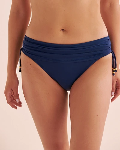 Bas de bikini aux hanches froncé Kore