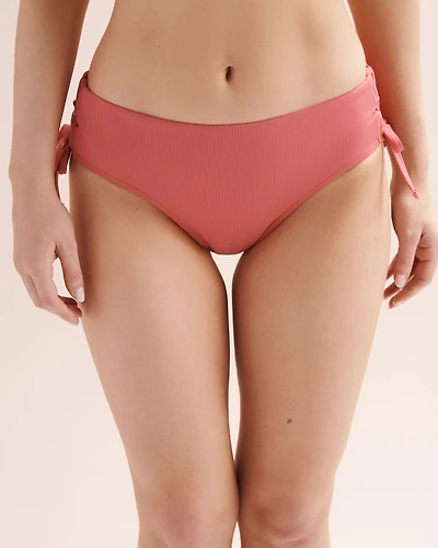 Bas de bikini taille basse gainant à nouer côtel