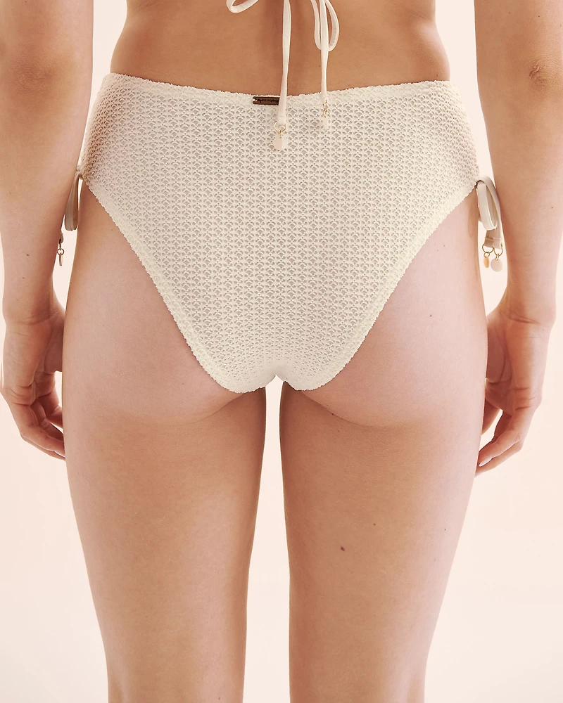 Bas de bikini coupe échancrée en crochet