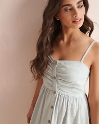 Robe longue rayée boutonnée à l'avant