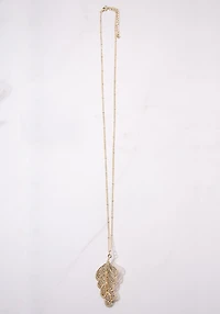 necklace with layered filigree pendant