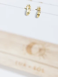 candy huggie earrings white