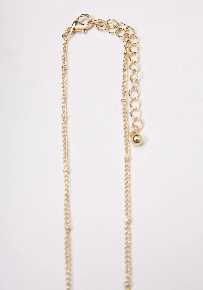 necklace with layered filigree pendant