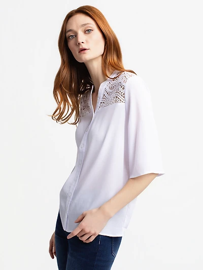 Blouse ample à manches 3/4 avec boutons