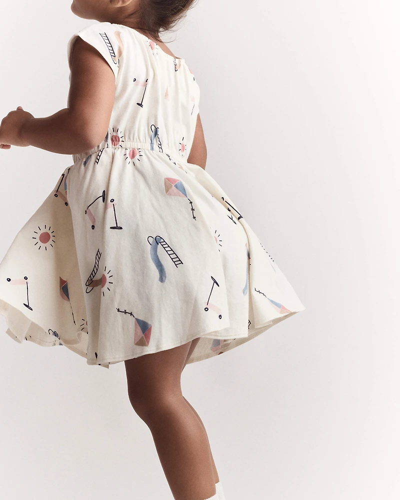 Toddler Girl Avenue Twirl™ Dress in Park Day Print - Cream