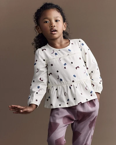Toddler Girl Peplum Long-Sleeve Top with Shapes - Ivory