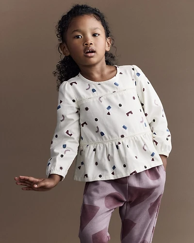 Toddler Girl Peplum Long-Sleeve Top with Shapes - Ivory