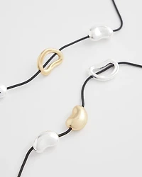 Mixed-Metal Charm Necklace
