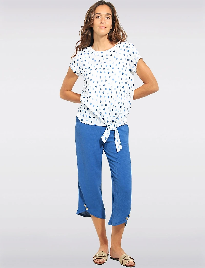 Trendy Polka Dot Print Cap Sleeve Top with Side Tie at the Hem by Devia