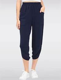 Elastic Waist Asymmetrical Hem Balloon Pant With Patch Pockets By Froccella