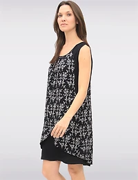 Versatile Black & White Sleeveless Dress with Printed Flowy Overlay by Devia