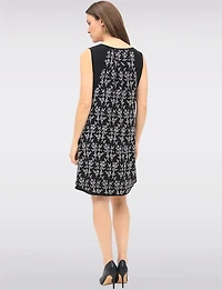 Versatile Black & White Sleeveless Dress with Printed Flowy Overlay by Devia
