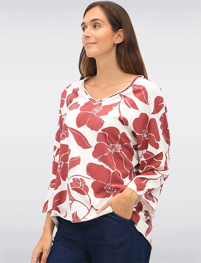 Floral Print Long V-Neck Top with Dropped Shoulders & Raw Edges by Froccella