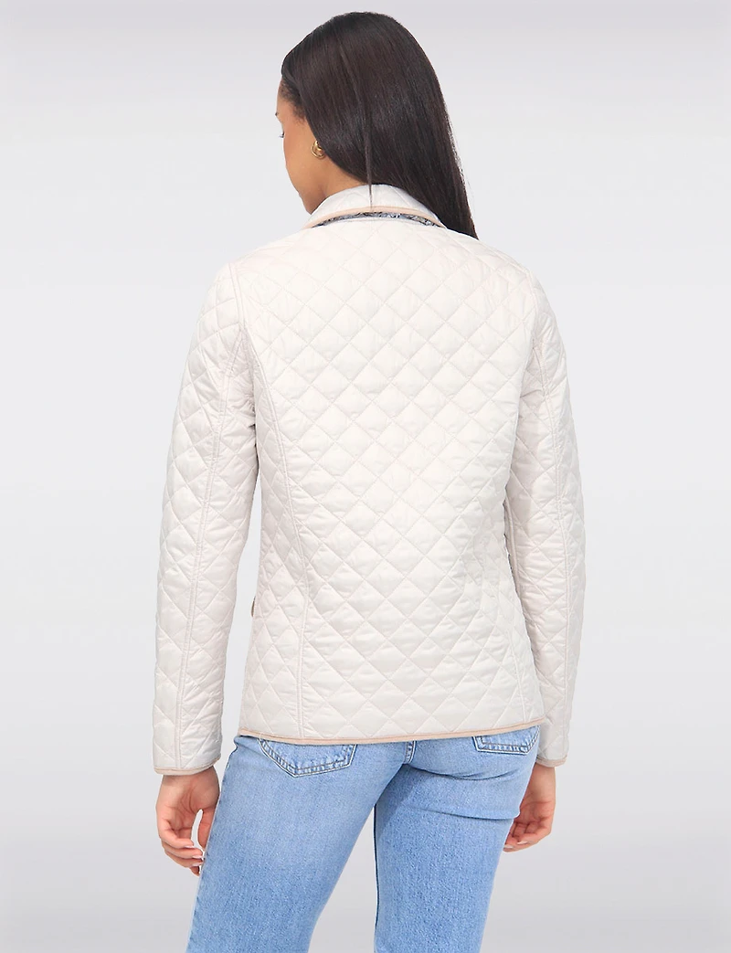 Vegan Reversible Print on Solid Quilted Jacket with Contrasting Trim by Saki