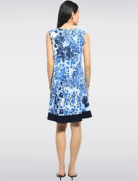 A-line Sleeveless Dress With a Blue Floral Print and Contrast Hem by Perle