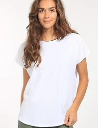 White Textured Stretchy Knit Short Sleeve Scoop Neck Rounded Hem Top by Perle
