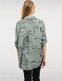 Elegant High-Low Button-Up Shirt with Abstract Script Design by Froccella