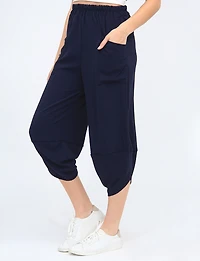 Elastic Waist Asymmetrical Hem Balloon Pant with Patch Pockets by Froccella
