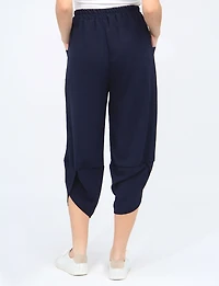 Elastic Waist Asymmetrical Hem Balloon Pant with Patch Pockets by Froccella