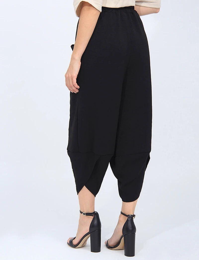 Elastic Waist Asymmetrical Hem Balloon Pant with Patch Pockets by Froccella