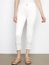Slim-Fit Stretch Crop White Jeans with Elegant Embroidered Hem by Charlie B