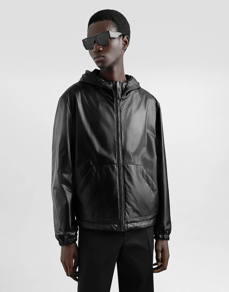 Leather and fabric jacket with reversible hood