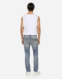 Light blue skinny stretch jeans with rips
