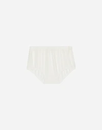 Empire-line muslin christening dress with short sleeves