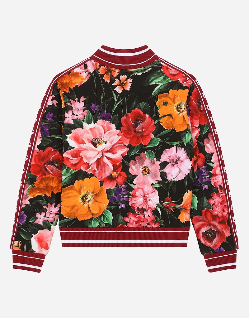Jersey sweatshirt with floral print over a black background