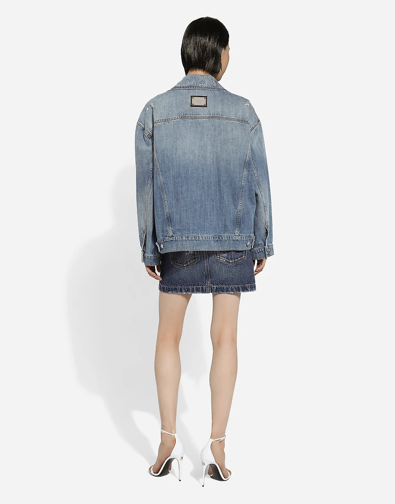 Denim jacket with branded plate