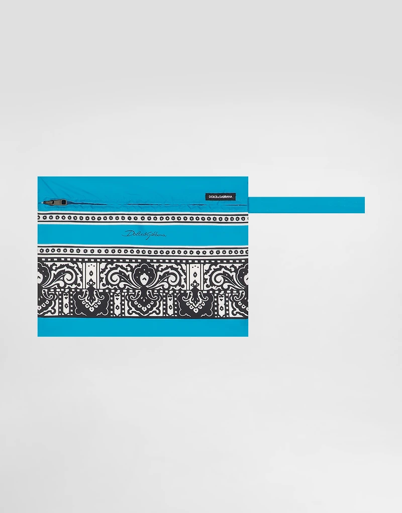 Mid-length swim trunks with bandanna print