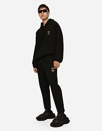 Jersey jogging pants with embroidery