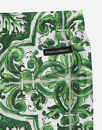 Nylon swim trunks with green majolica print
