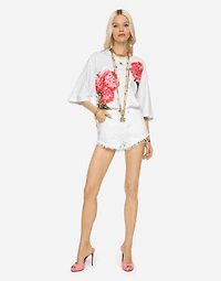 Denim shorts with ripped details and abrasions