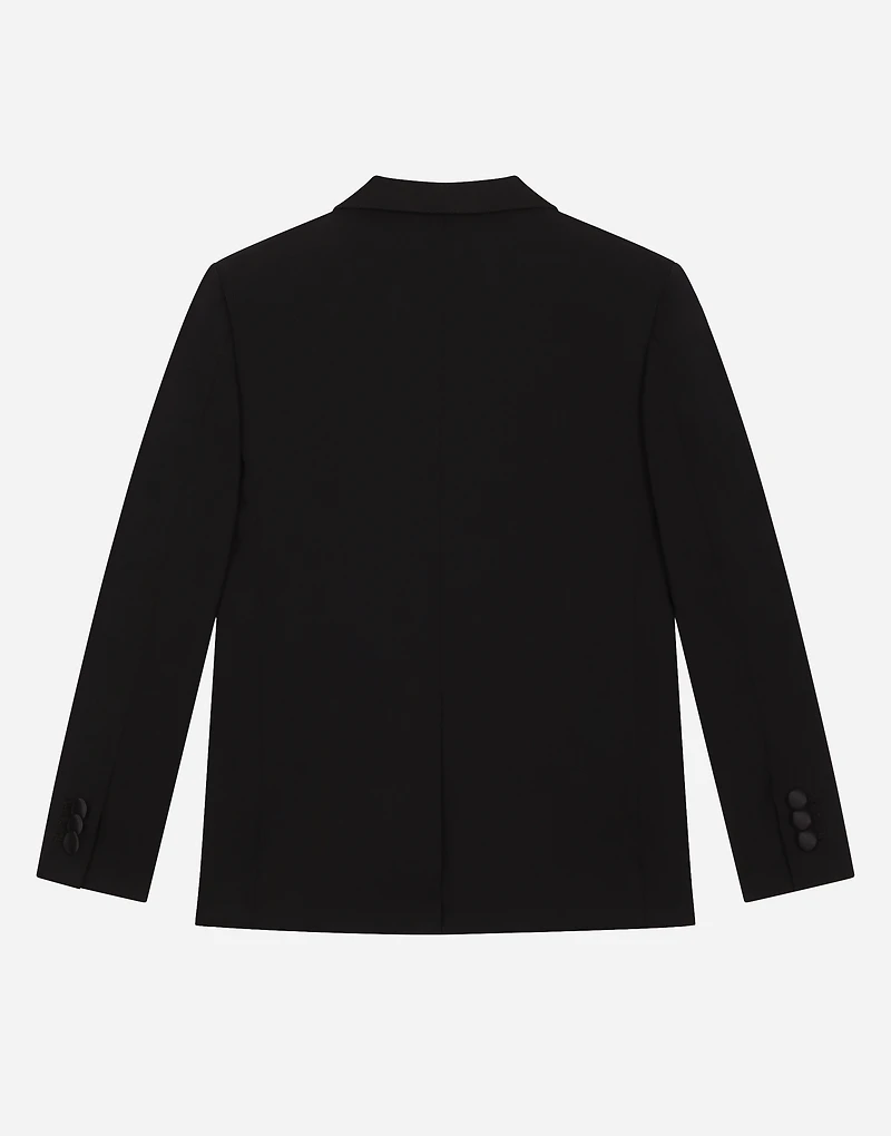 Single-breasted woolen jacket with duchesse inserts