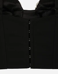 Corset top with rhinestone embellishment