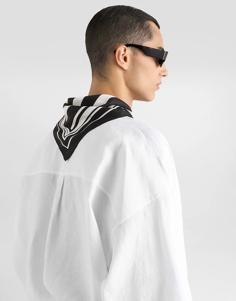 Long-sleeved silk shirt with pussy-bow