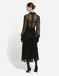 Calf-length tulle tuxedo shirt dress with sequin embellishment