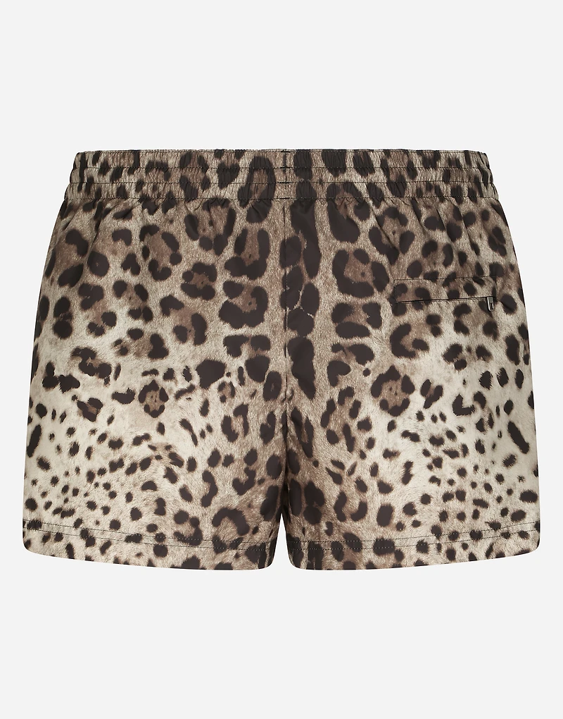 Short swim trunks with leopard print