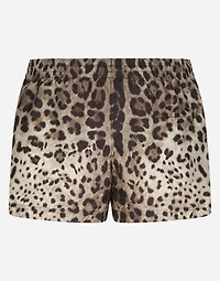 Short swim trunks with leopard print