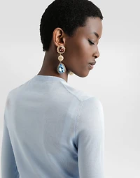 Silk pullover with flower brooch