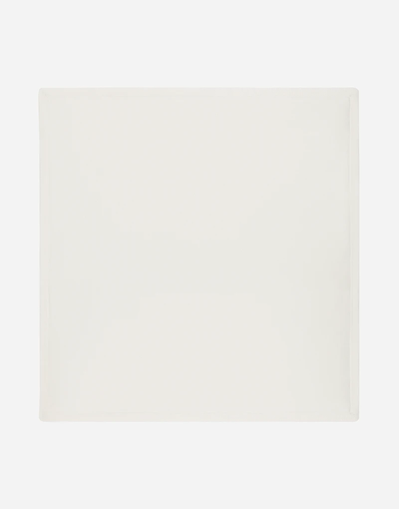 Knit blanket with jacquard logo