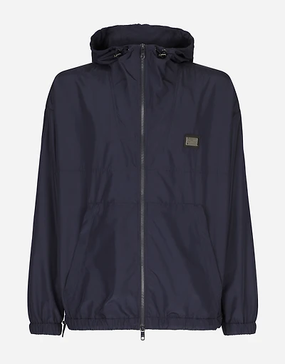 Nylon jacket with hood and branded tag